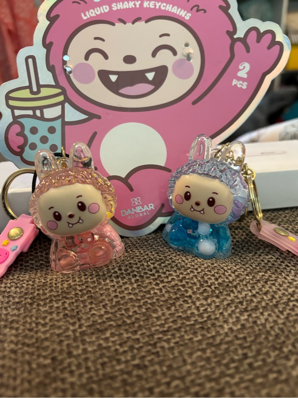 Liquid Shaky Character Keychain Duo — Pink & Blue